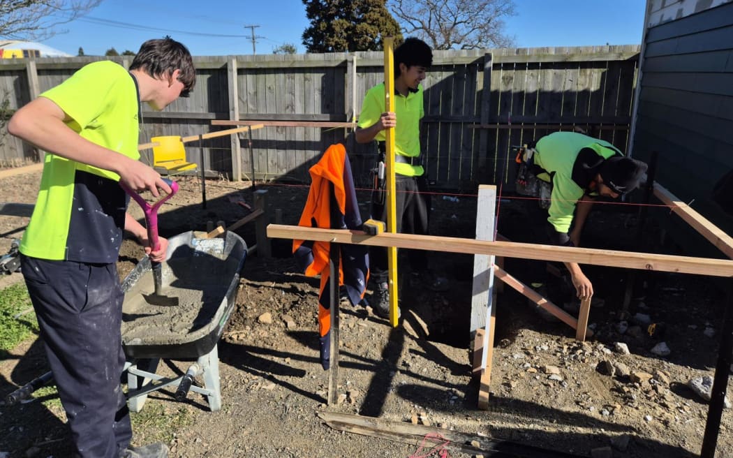 About 60% of the students go on to professional trade apprenticeships, and the building programme hires two students from each year as apprentices to help them out. Photo / Alexa Cook, RNZ