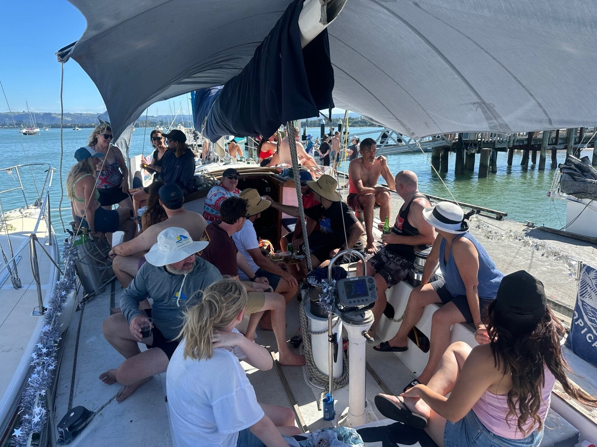  The 2024 Christmas raft-up at Ōmokoroa wharf with boats tied together. 
