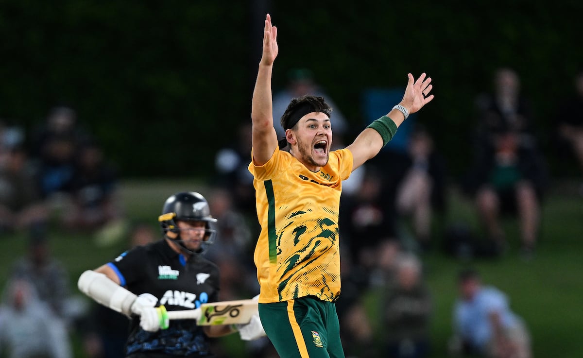 New Zealand batsman walking off the field after being dismissed