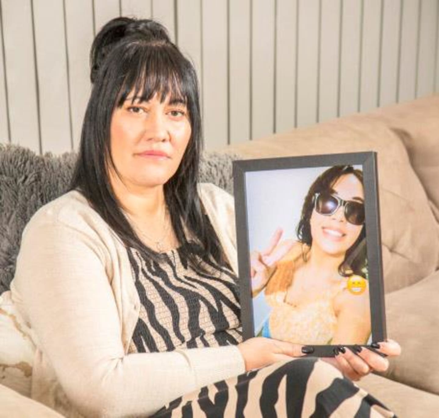Jasmin Gray holds a photograph of her daughter Breanna Muriwai. Photo / Woman's Day
