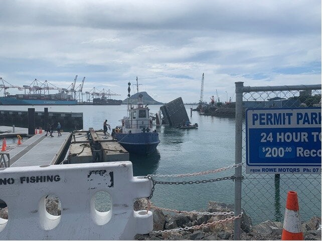 On Monday afternoon, Bay of Plenty Regional Council staff were notified that a 30m barge operating at the Bridge Marina had tipped on its side, resulting in the crane lying in the water. Photo / Supplied