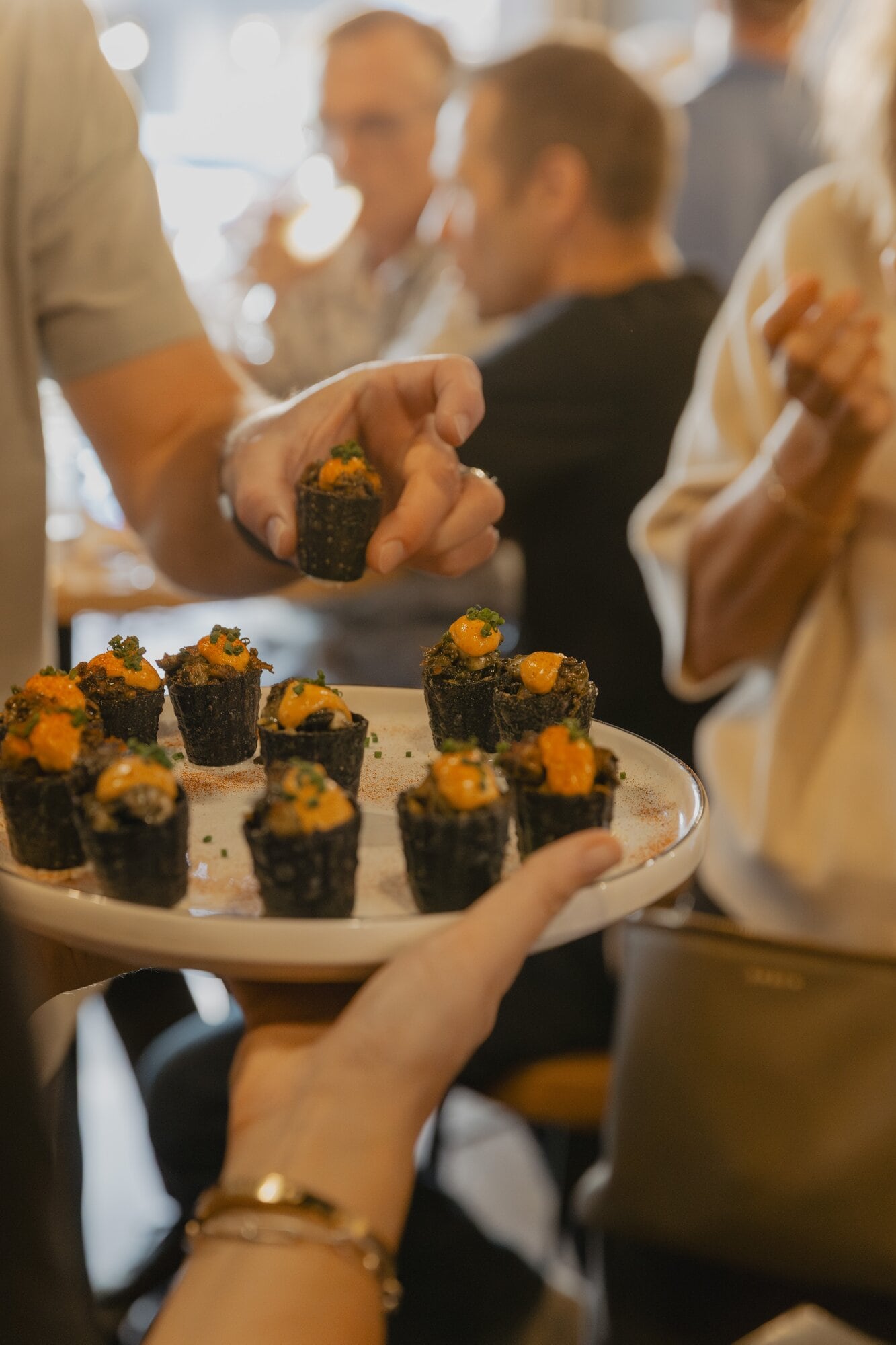  The chargrilled octopus, romesco, potato, herb, and squid ink snack which earned the Judge’s Choice title.