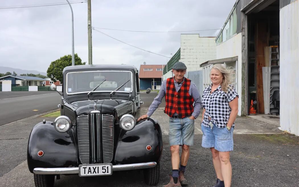 Business partners Sam Annison and Connie Riddle with Sam's favorite second-hand find - a 1951 London Taxi. Photo / RNZ