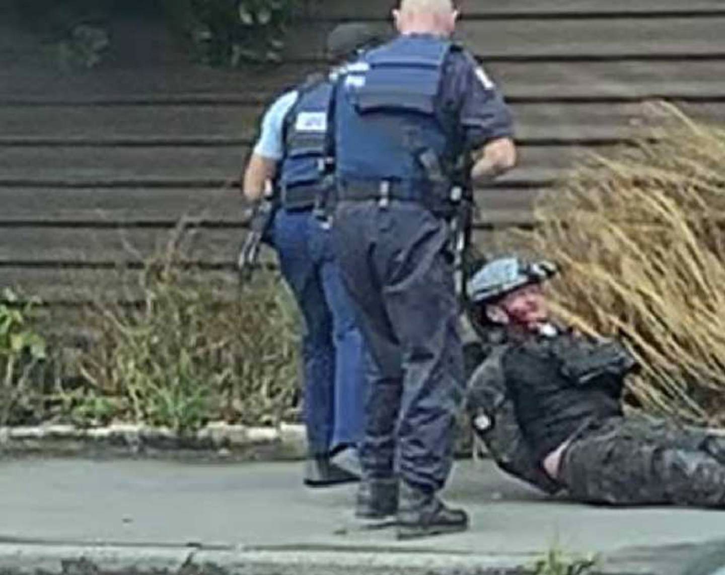 New Zealand police arrest the gunman after an attack on two mosques in Christchurch on March 2019. Photo / Supplied