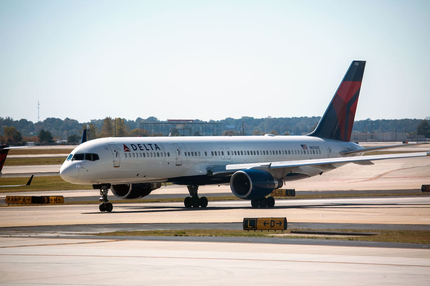 Two people died after a plane tyre exploded while it was being changed at the world’s busiest airport. Photo / 123RF