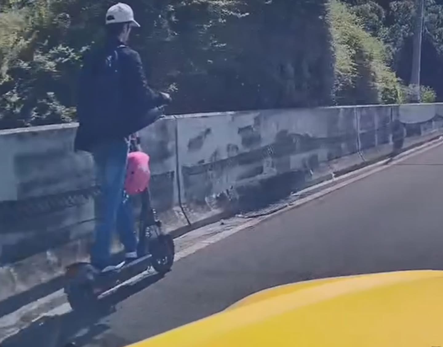 Dashcam footage of somebody riding an electric scooter on Auckland’s Southern Motorway in February.
