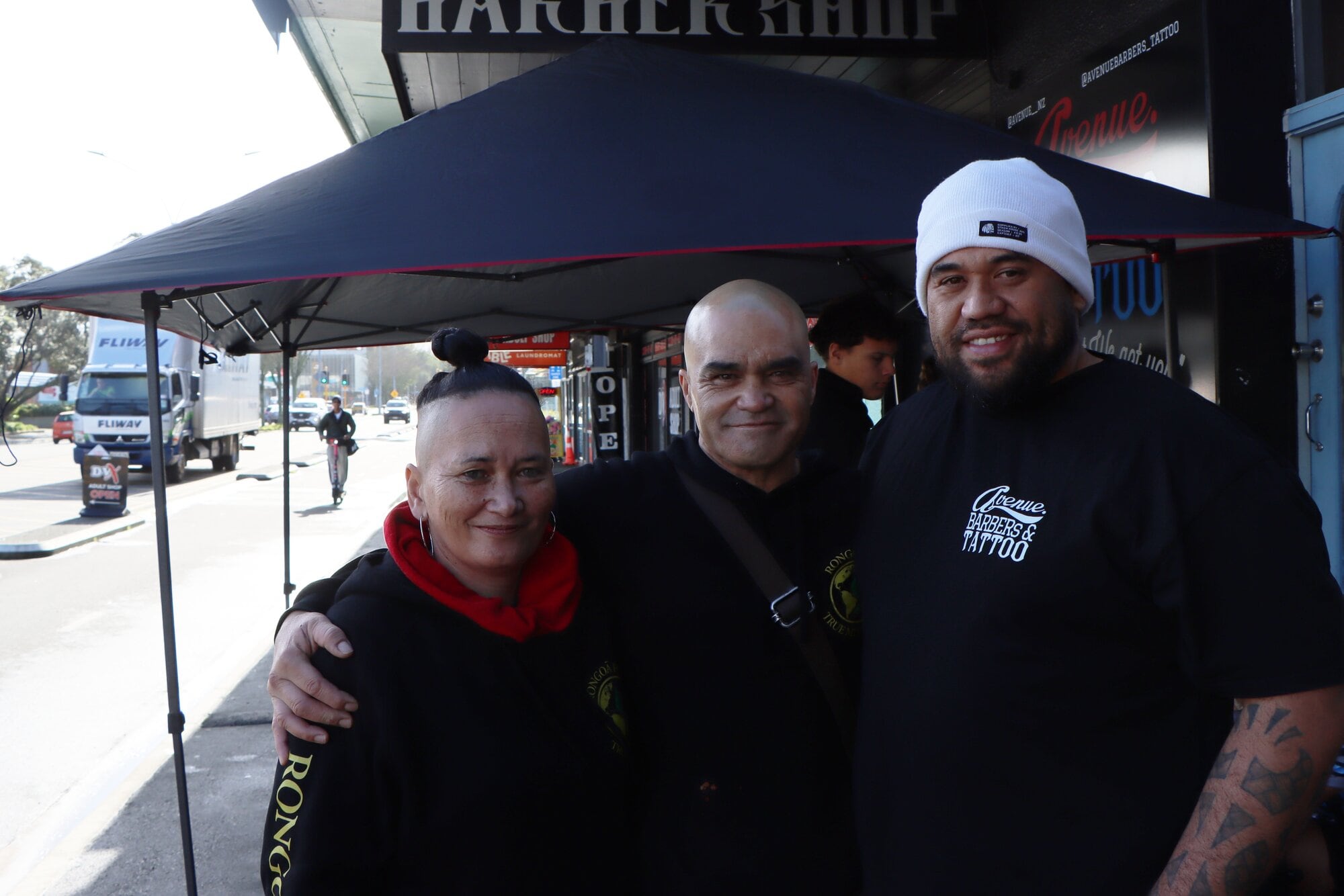 Haeata Charitable Trust Founders (left) Teisha Jackson and Anton Jackson, and (right) Avenues head barber Shanon Ratahi. Photo / Tom Eley