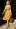 A model wears a creation by Bottega Veneta. Photo / AP
