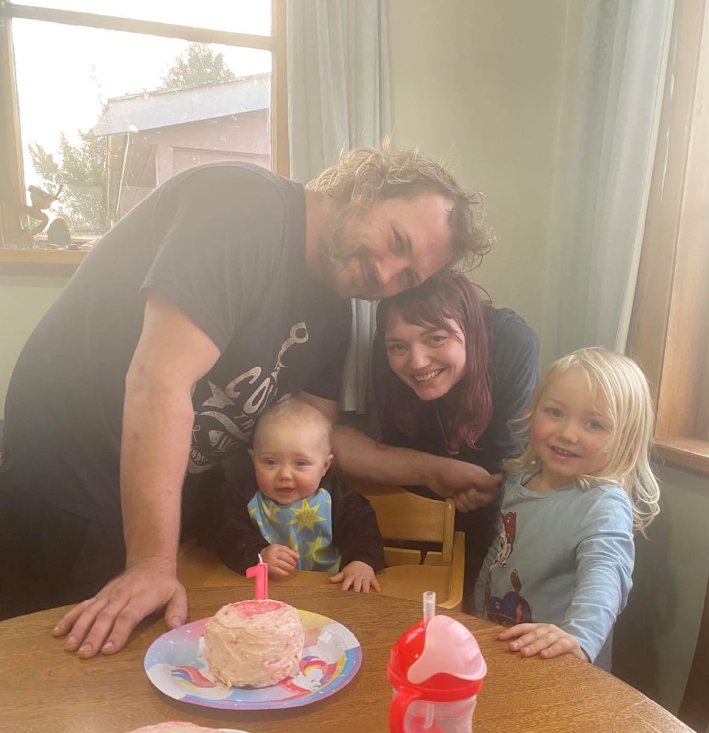 Natasha Brucker, pictured with her two children and partner, has credited the love of her life Josh Coles for loving her at the lowest and most crippling moments of her life.