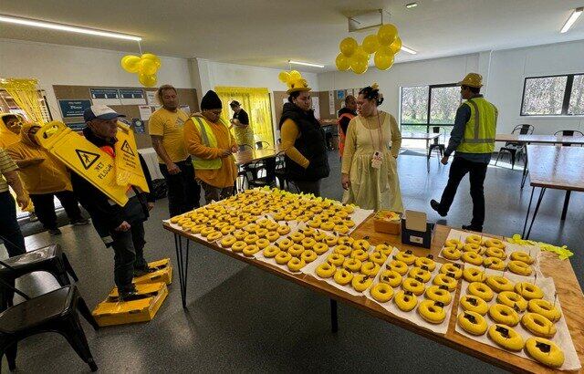  Hume Pack-N-Cool staff coordinated their outfits with yellow donuts for Daffodil Day 2024 – now they’re excited to up the ante this year. Photo / Supplied