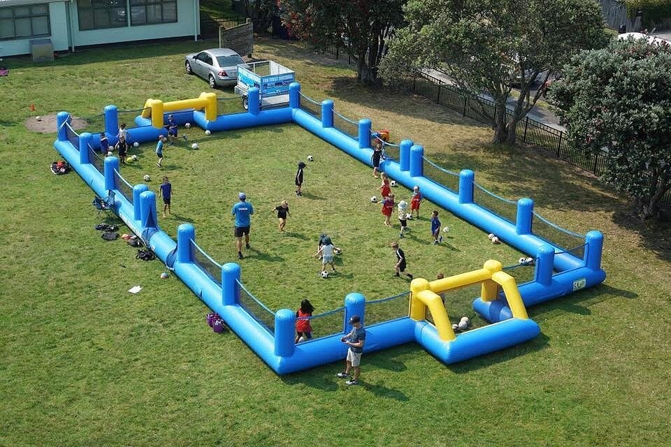  Kids enjoying Fun First Football in an inflatable playing field.  Photo / Supplied.