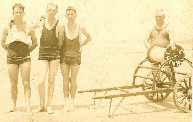 John Moon & others with original reel - Earliest photo Lifeguards on Waihī Beach circa 1920s – before the Waihi and Waihī Beach Lifesaving Club was formed in 1935. Photo / Supplied