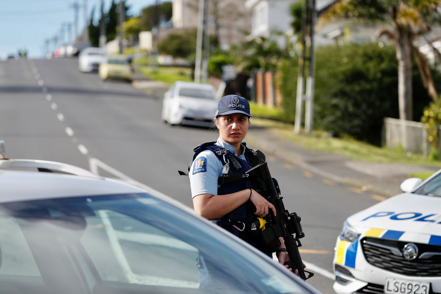 Armed police are descending on a Mt Roskill street with roads closed and cordons erected. Photo / Dean Purcell