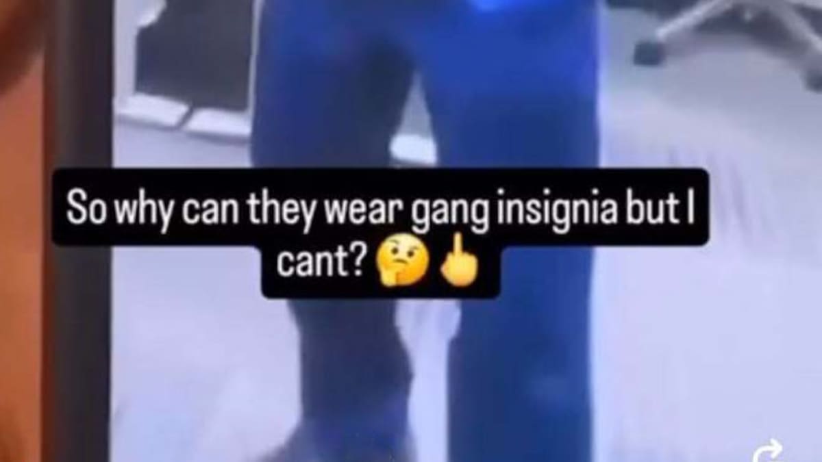 Watch: ‘Behaviour falls well short of expectations’ – Cop caught posing in gang patch Watch: ‘Behaviour falls well short of expectations’ – Cop caught posing in gang patch