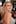 <b>2014</b><p>The British rose looked every bit the Hollywood icon when arriving at the premiere of <i>The Search</i> at the 67th Cannes Film Festival (or maybe she has the perfectly timed gust of wind to thank for that). Achieving shiny, healthy looking hair can be a challenge for any blonde, but Rosie’s stylist rose to the challenge. A glitter and taupe eye look assisted her over the shoulder smoulder, while a pinky-nude gloss drew attention to her full lips.<p>Photo / Getty Images