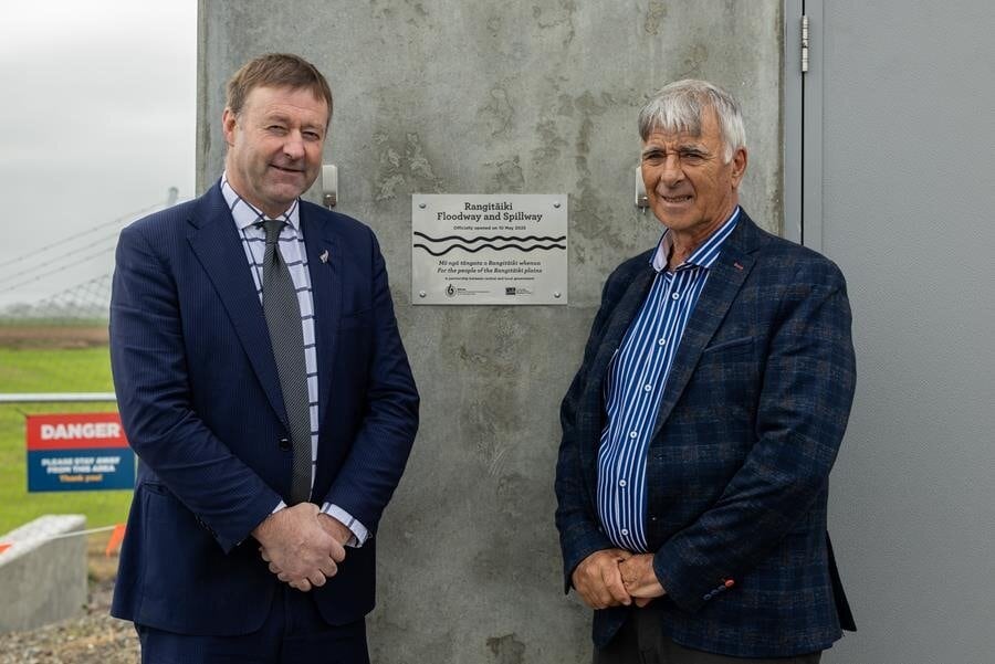 Associate Regional Development Minister Mark Patterson and Bay of Plenty Regional Council chair Doug Leeder unveil a plaque on the new Rangitāiki Spillway. Photo / BOPRC