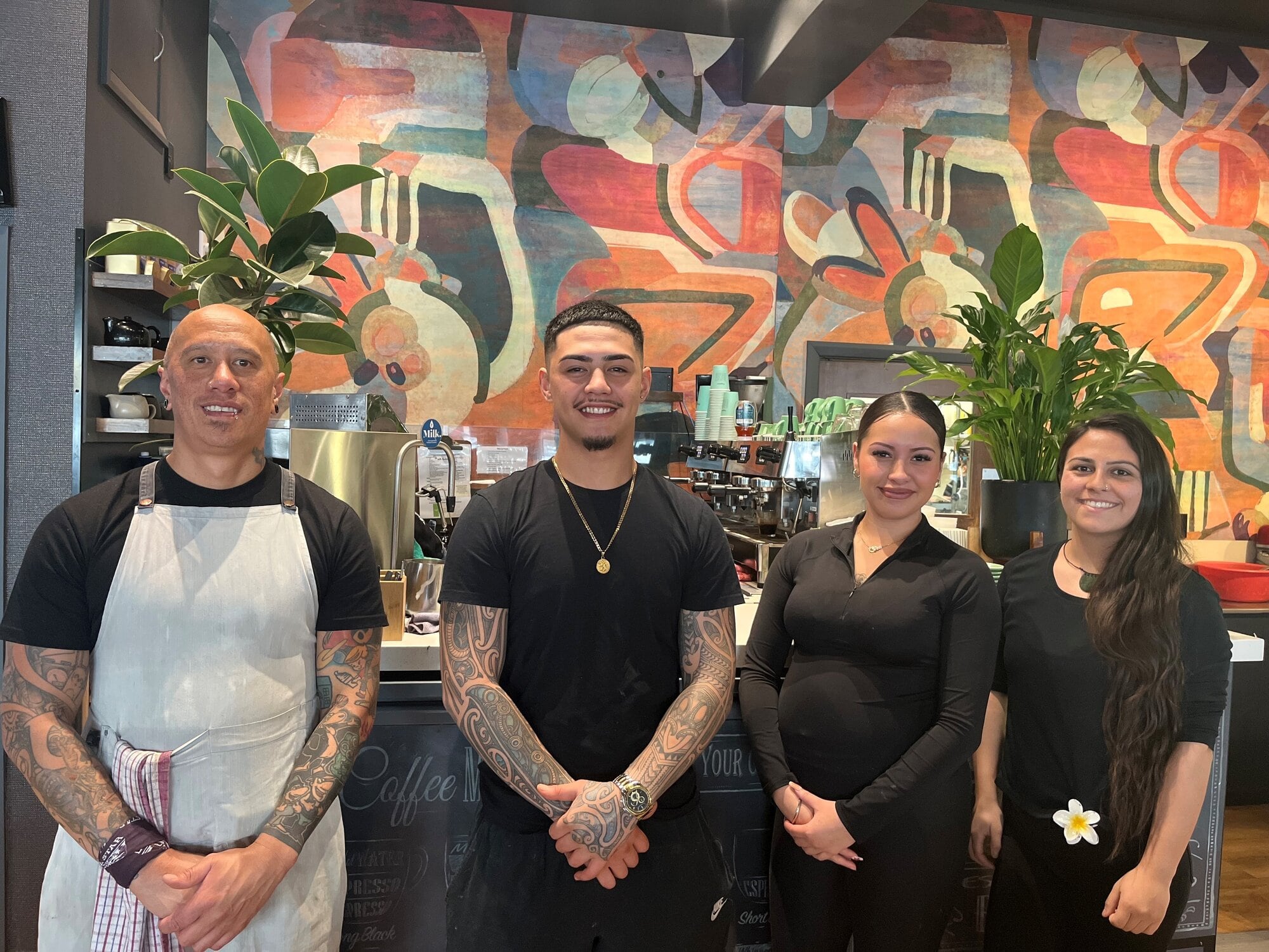 Caper’s Café & Store head chef Jay Baker with Zion Te Kowhai, Paris Mohi and Angela Lobes. Photo / Annabel Reid