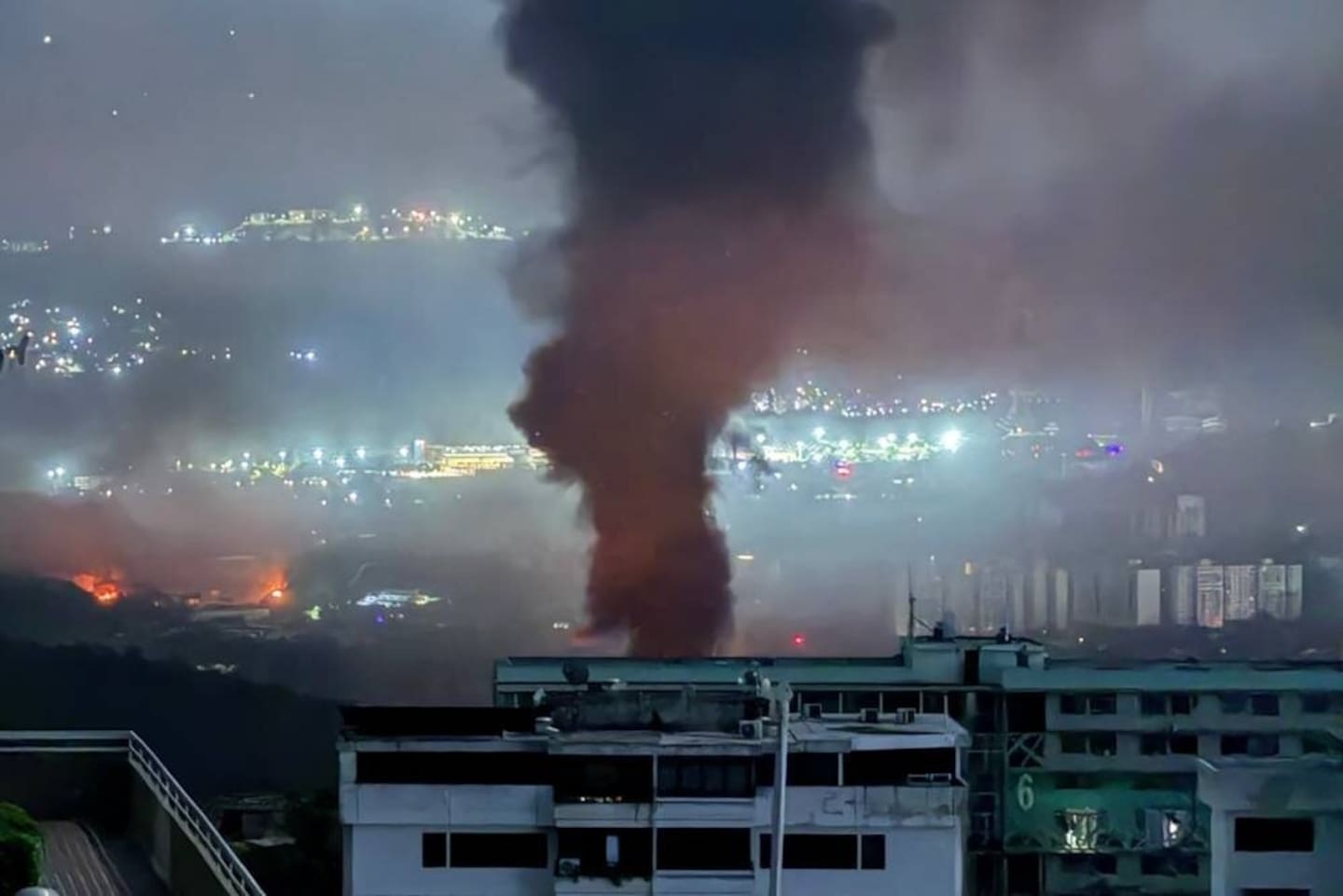 Smoke billowing over Caracas after a series of explosions part of a US military operation that led to the capture of Venezuelan President Nicolas Madruo. Photo / Jose Abreu, X, AFP