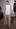 A model wears a creation by Jil Sander. Photo / AP