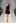 A model wears a design by Yvonne Bennetti as part of the Little Black Dress show. Photo / Getty Images