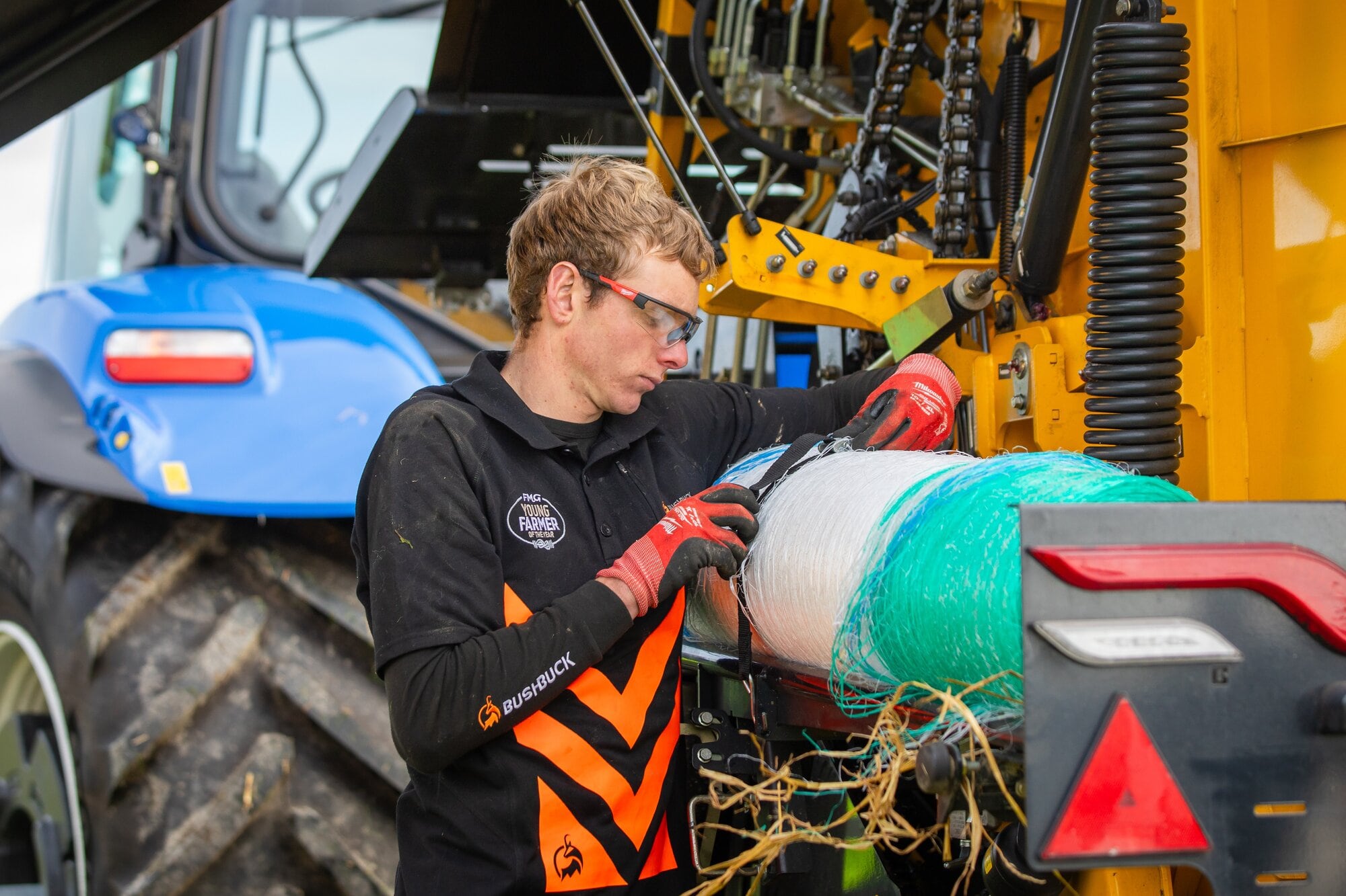  Baling hay was challenging for Hugh who hadn’t done it before. Photo / NZ Young Farmers
