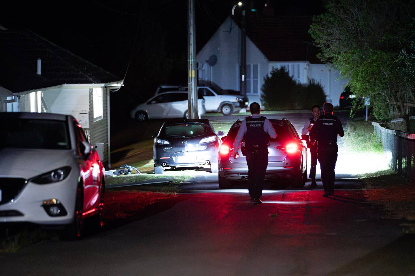 Detectives from Auckland City are on Birchfield Road, where lime scooters were recovered, linked to the getaway ride following an armed robbery at The Rudder on Hauraki bar. Photo / Hayden Woodward