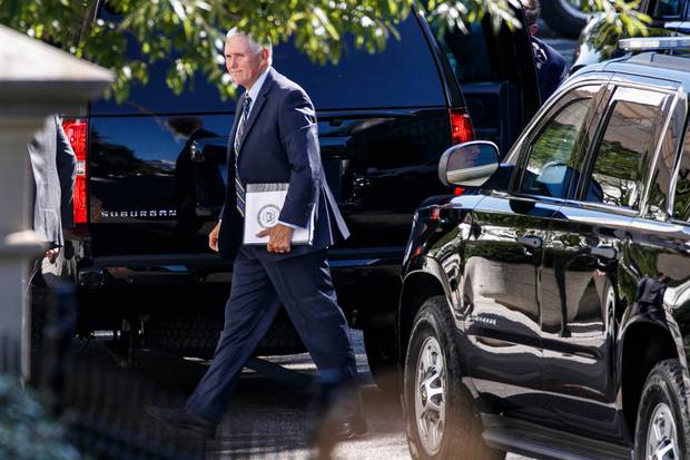 Vice President Mike Pence arrives to the West Wing of the White House, Sunday. Photo / AP