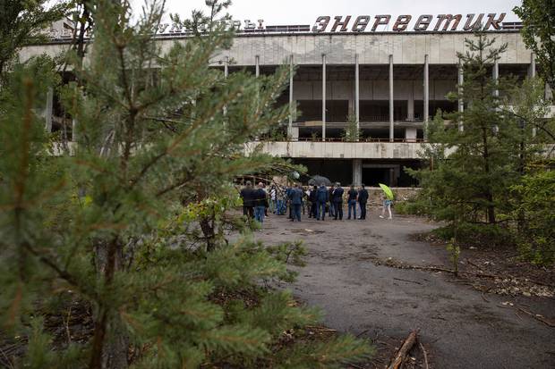 Ukrainian President Volodymyr Zelenskiy and other officials visit the abandoned city of Prypyat some 3km from Chernobyl. Photo / AP