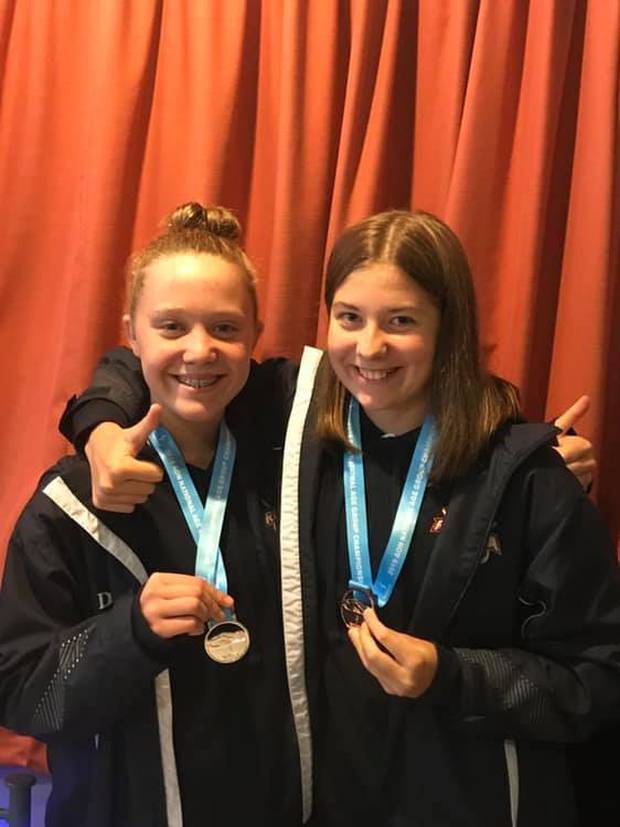 Nikita Pola (left), 14, and Lina Stahlhut, 14, won medals at the New Zealand Age Group Swimming Championships in May. Photo / Supplied