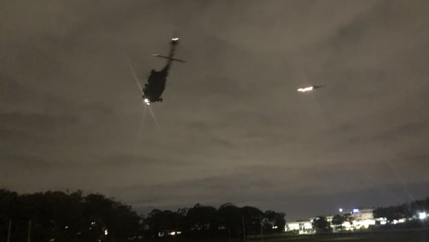 The two helicopters landed on Auckland Domain for a short time before leaving. Photo / Supplied