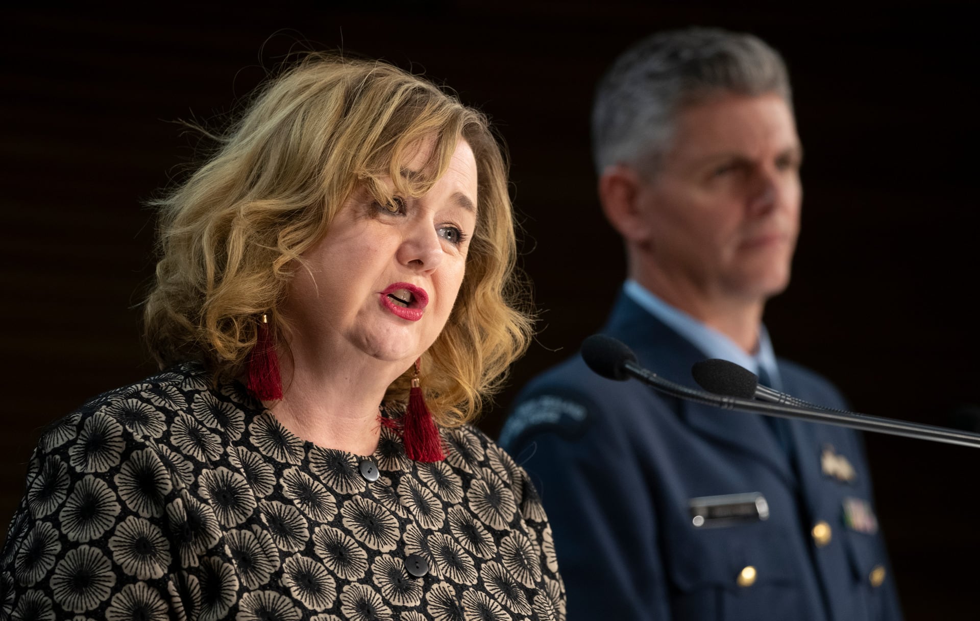 Cabinet Minister Megan Woods and Air Commodore Darryn Webb detailed the charges for some returnees yesterday. Photo / Mark Mitchell