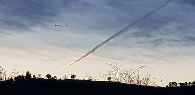 The incredible photos show the mysterious object flying across the sky and landing in Canterbury. Photo / Lindsay Williams
