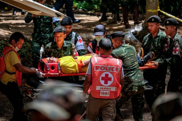 Thai rescue workers practice medical training on an entrance of Tham Luang Nang Non cave. Photo / Getty Images