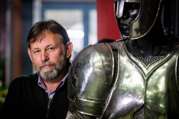 Weta Workshop general manager David Wilks stands next to one of the many props produced at the Miramar-based operation. Photo / Mike Scott