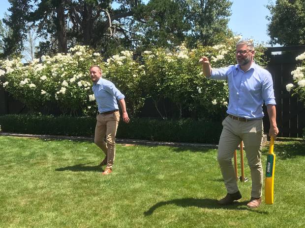 Wielding a plastic bat, Immigration Minister Iain Lees-Galloway, right, hits it for six, while Wairarapa MP Kieran McAnulty watches. Photo / Jason Walls