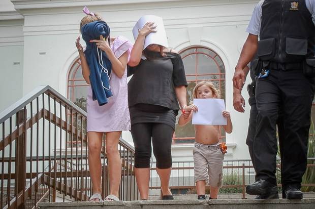 The tourist family accused of bad behaviour leaving the Hamilton District Court today. Photo / Christine Cornege