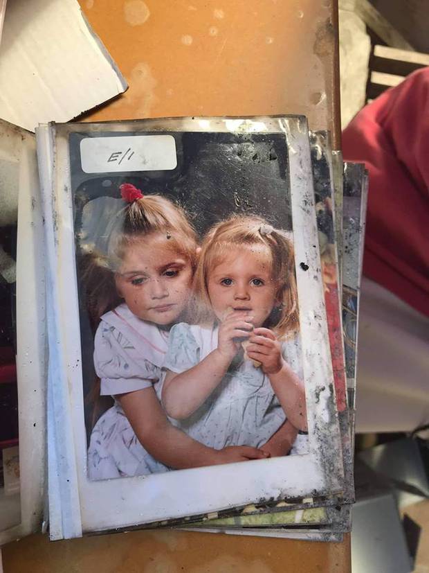 The charred remains of a photo album at the Smith family home in Paremoremo. Photo / Supplied 