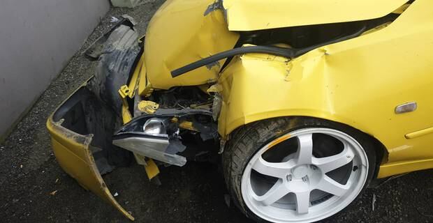 The car was slammed into a pole by the steam roller. Photo / Melissa Nightingale
