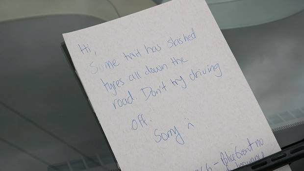 A note left after more than 10 cars had their tyres slashed on one North Shore street.