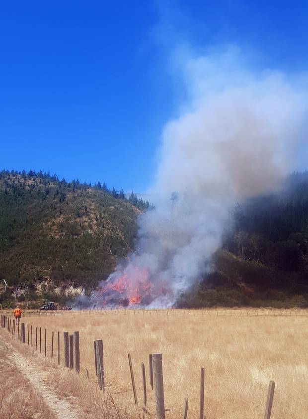 The <i>Herald</i> revealed on Wednesday that a contractor ploughing a tinder-dry field up Pigeon Valley was suspected to have sparked the blaze. Photo / Joel Scott