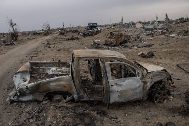 Destroyed vehicles are seen in the final Isil encampment on March 24, 2019, in Baghouz, Syria. Photo / Getty Images
